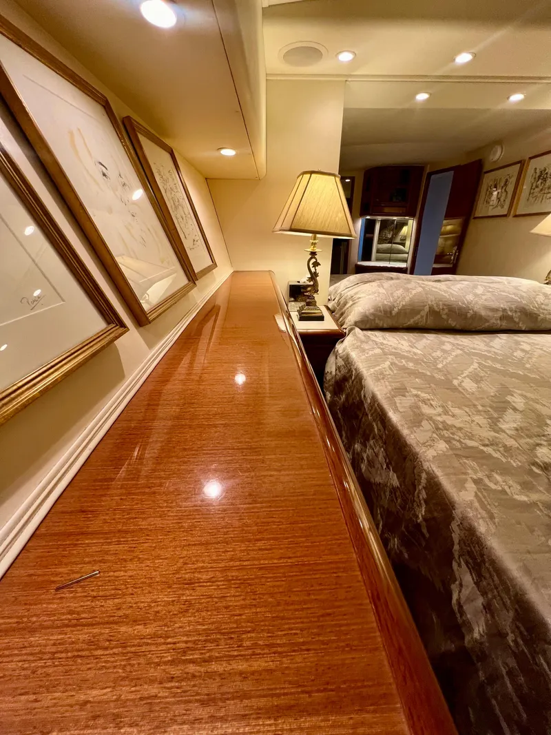 Slide: The Image of Luxurious cabin interior of 1999 Viking Conv Sport Fisher yacht with elegant decor. - 18