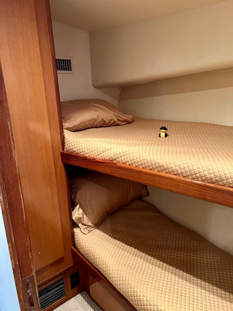 Slide: The Image of 1999 Viking Conv Sport Fisher cabin with cozy twin bunk beds. - 25