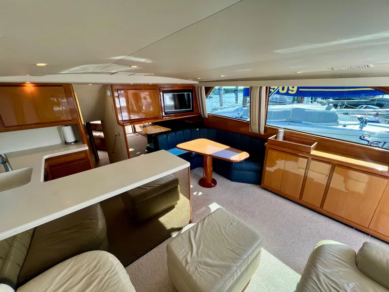 Slide: The Image of Luxurious interior of 1999 Viking Conv Sport Fisher yacht with modern furnishings. - 8