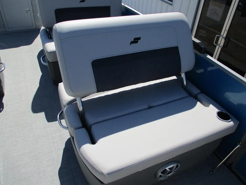 Slide: The Image of 2025 Starcraft CX 23 RL boat seating with gray upholstery and cup holder. - 16