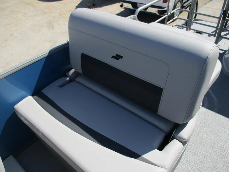 Slide: The Image of Starcraft CX 23 RL 2025 boat seat with gray upholstery and sleek design. - 18