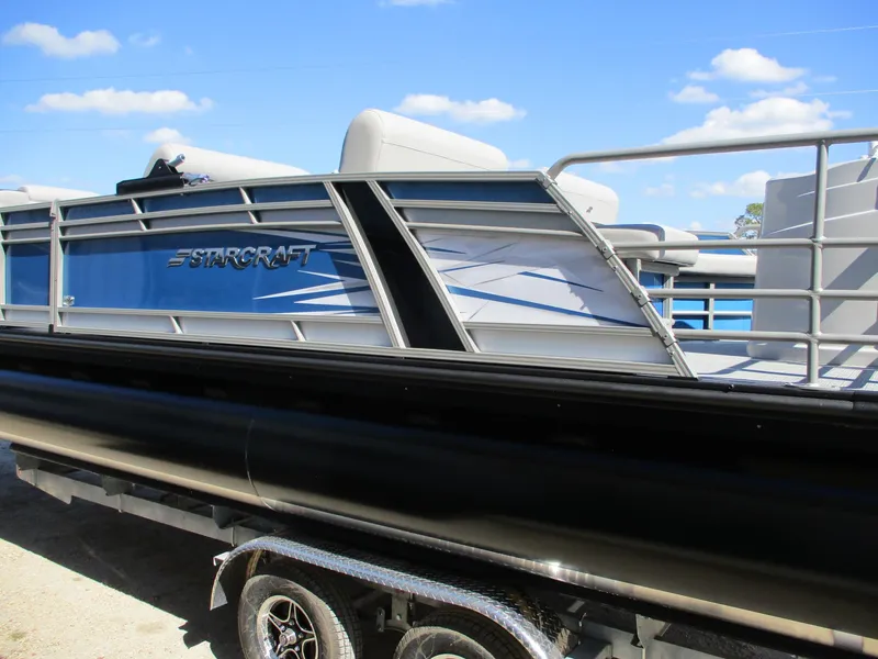 Slide: The Image of 2025 Starcraft CX 23 RL pontoon boat with sleek design and modern features. - 5