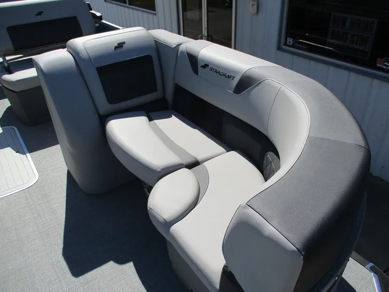 Slide: The Image of 2025 Starcraft CX 23 RL boat seating with gray upholstery. - 9