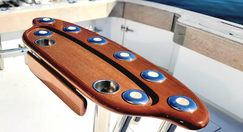 Slide: The Image of Wooden fishing rod holder on a 2017 L&H 33 boat deck. - 16