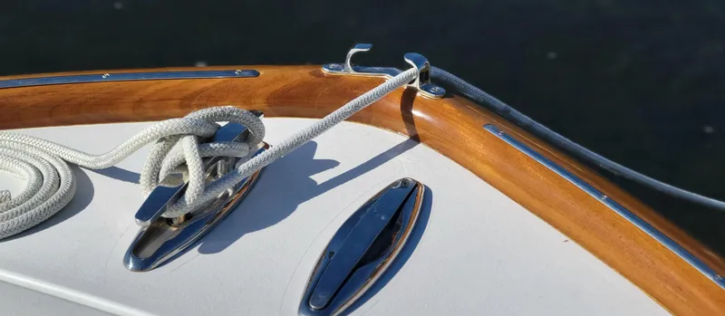 Slide: The Image of Close-up of 2017 L&H 33 boat deck with rope and cleat. - 20