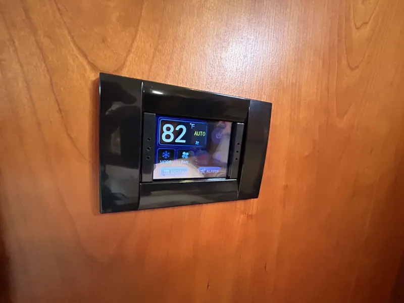 Slide: The Image of Luxurious cabin interior of 2008 Rivolta Coupe 4.5 with cozy bed and wooden accents. - 14