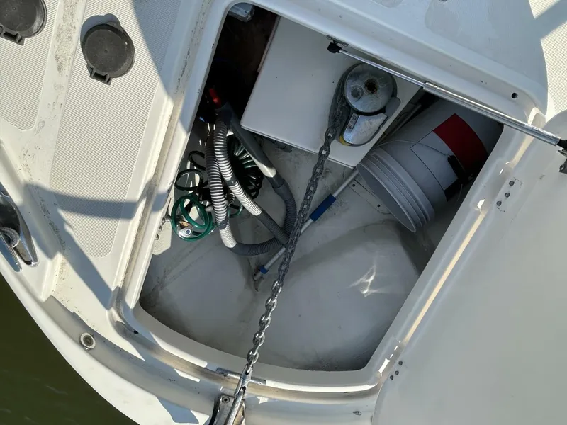 Slide: The Image of Wood-paneled interior of 2008 Rivolta Coupe 4.5, featuring sleek cabinetry and modern controls. - 22