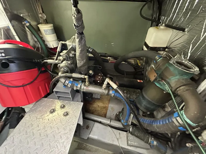 Slide: The Image of Luxurious 2008 Rivolta Coupe 4.5 interior with elegant seating and wooden table, overlooking marina. - 31