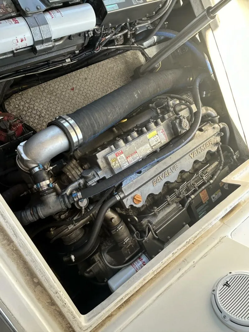 Slide: The Image of Luxurious 2008 Rivolta Coupe 4.5 yacht interior with wooden accents and scenic water view. - 33