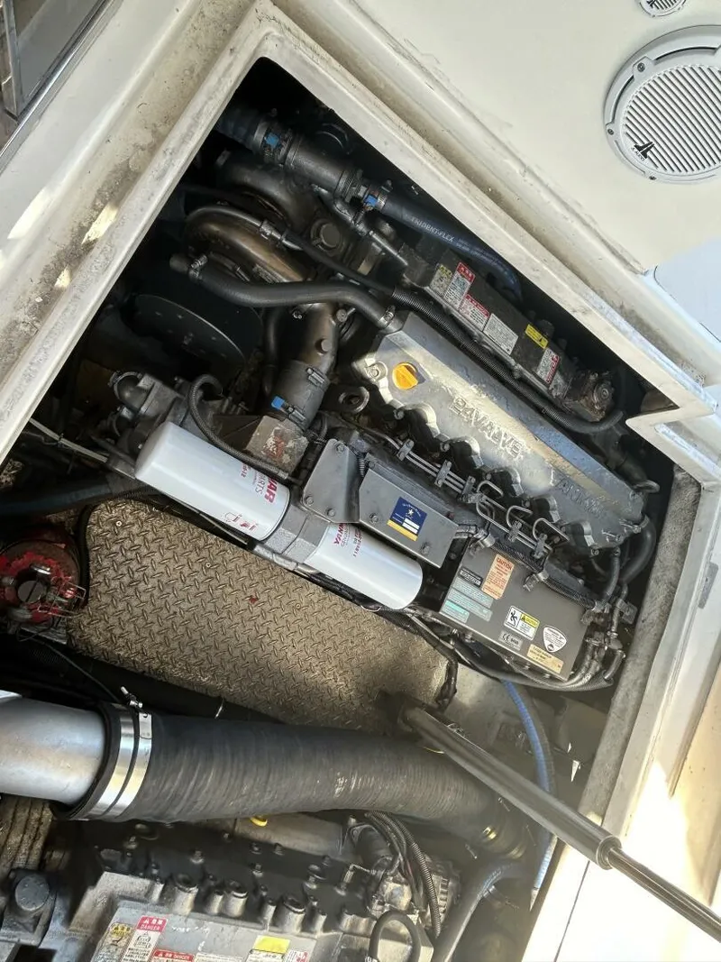 Slide: The Image of Luxurious 2008 Rivolta Coupe 4.5 yacht interior with wooden accents and navigation equipment. - 34