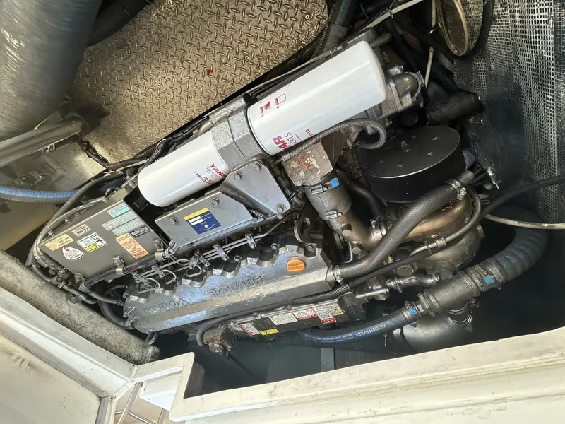 Slide: The Image of 2008 Rivolta Coupe 4.5 yacht docked at sunset, featuring sleek design and spacious deck. - 37