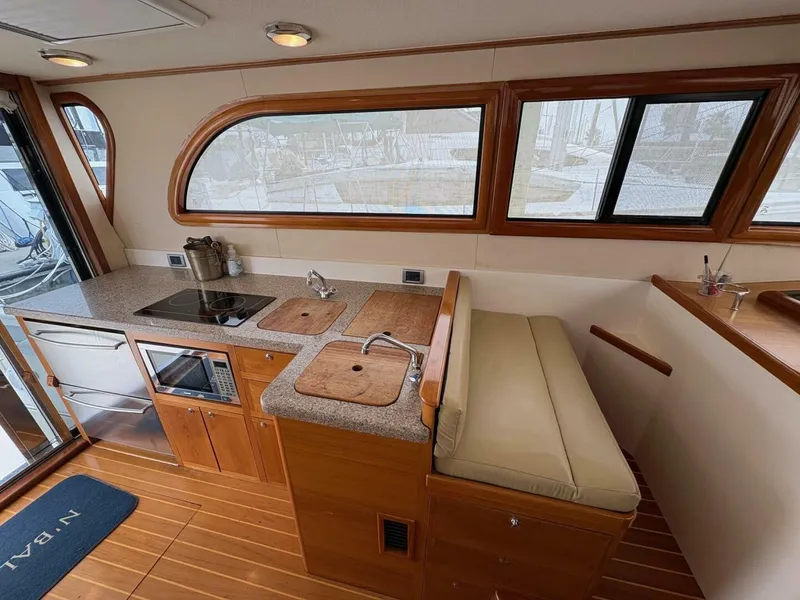 Slide: The Image of Luxurious kitchen interior of 2008 Rivolta Coupe 4.5 yacht with modern appliances. - 4