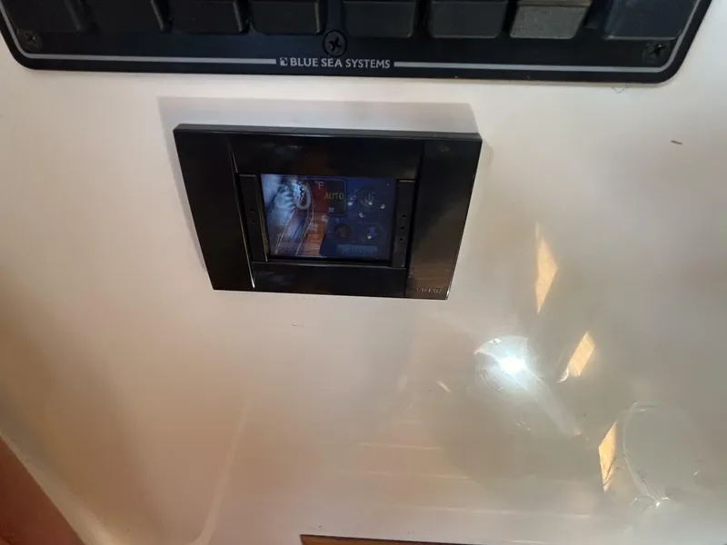 Slide: The Image of 2008 Rivolta Coupe 4.5 yacht docked at marina during sunset. - 42