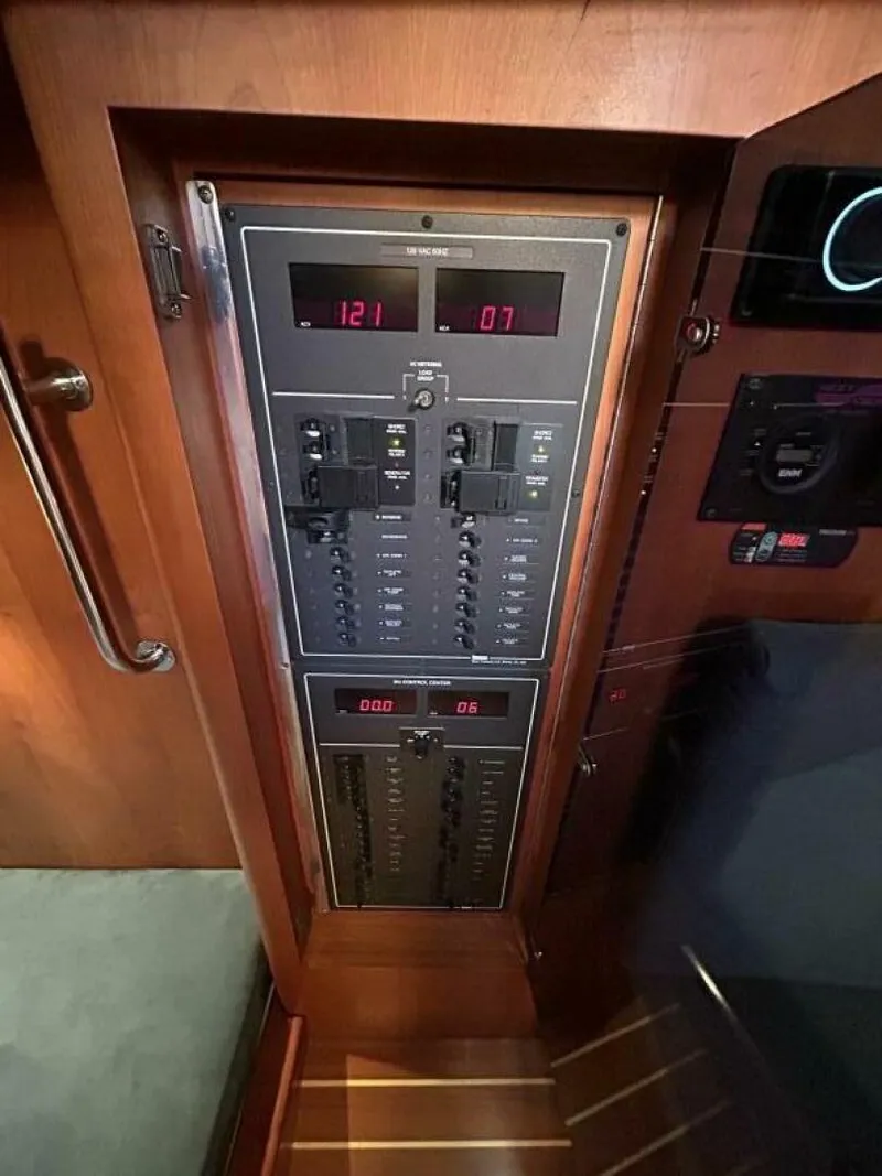 Slide: The Image of Luxurious interior of 2008 Rivolta Coupe 4.5 yacht with wooden furnishings and seating area. - 8