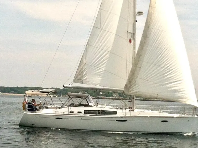 Slide: The Image of 2008 Beneteau Oceanis 46 sailboat cruising on calm waters. - 2