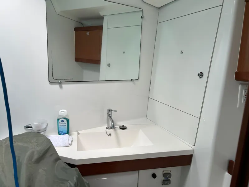 Slide: The Image of Bathroom interior of 2008 Beneteau Oceanis 46 yacht with sink and mirror. - 21