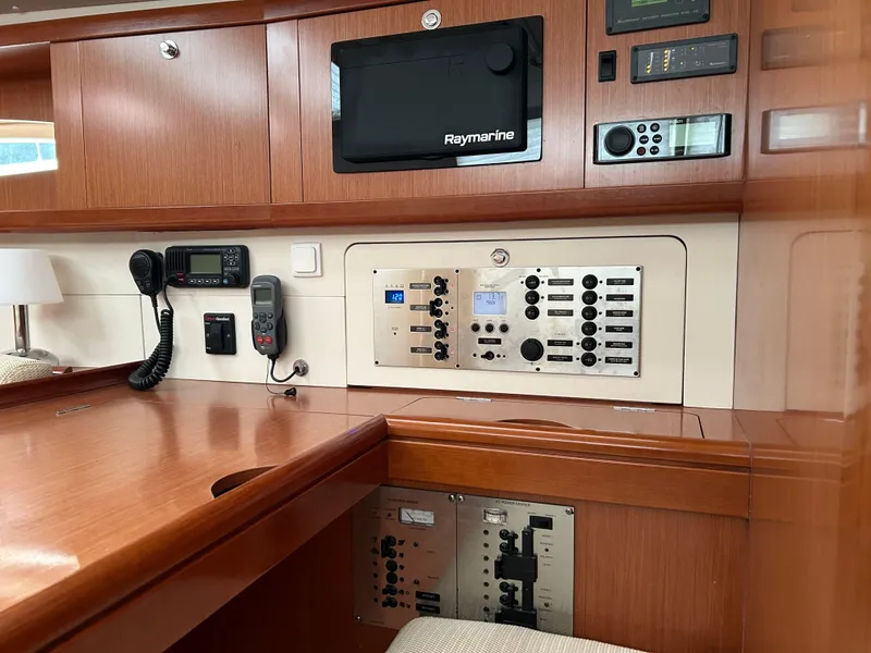 Slide: The Image of Control panel of a 2008 Beneteau Oceanis 46 sailboat with navigation equipment. - 32