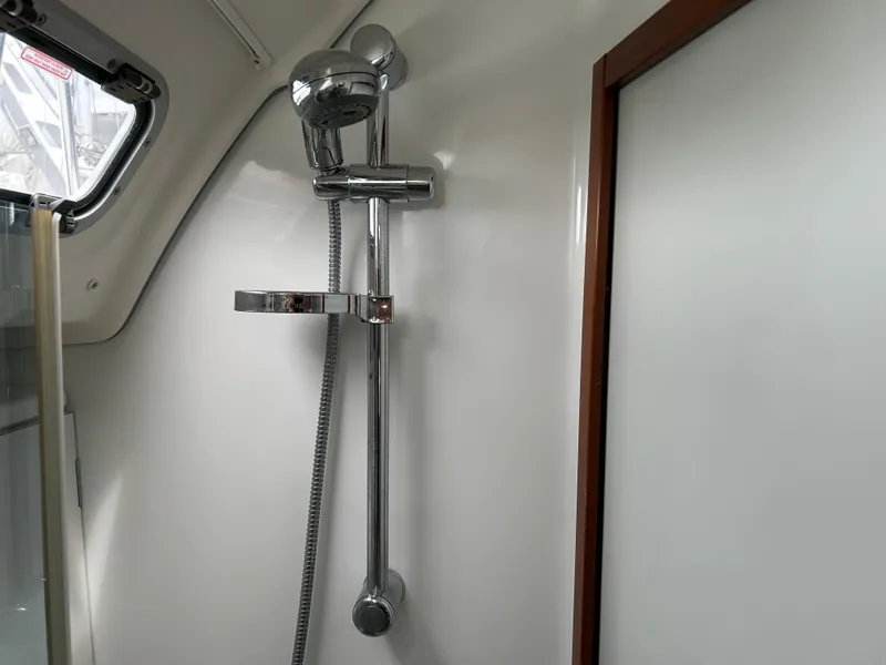 Slide: The Image of Shower area in 2008 Beneteau Oceanis 46 yacht, featuring chrome fixtures and sleek design. - 41