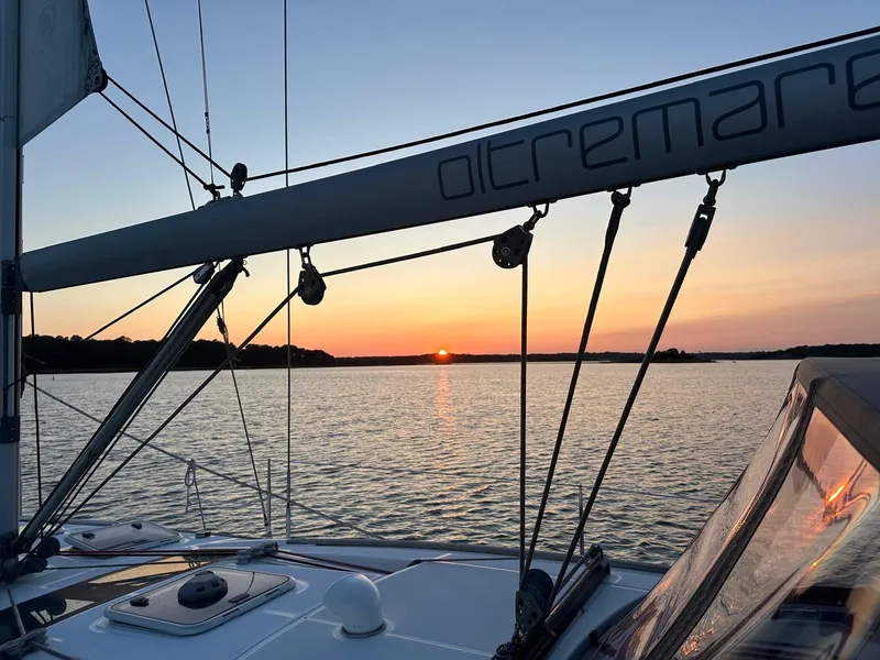 Slide: The Image of Beneteau Oceanis 46 sailboat at sunset on calm waters, 2008 model. - 5