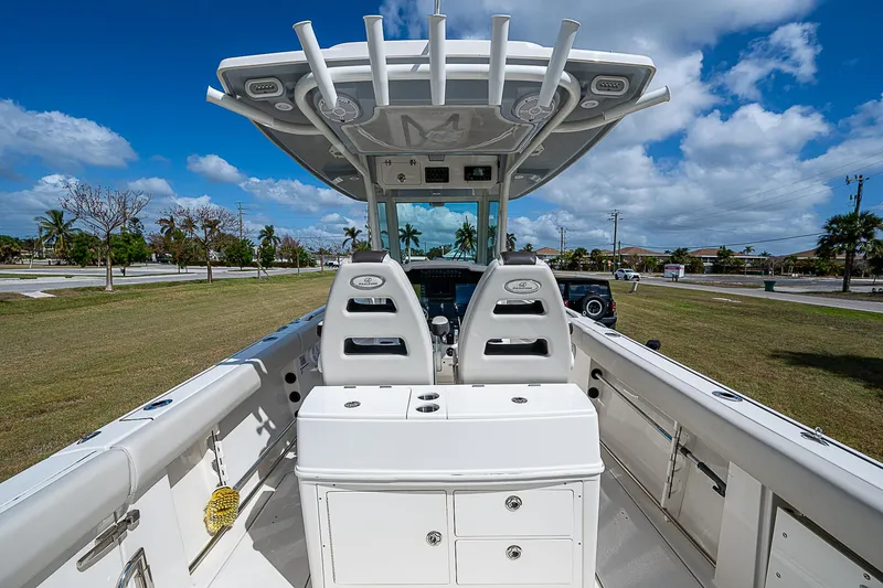 Slide: The Image of 2022 Sailfish 272CC boat interior with dual seats and storage compartments. - 23