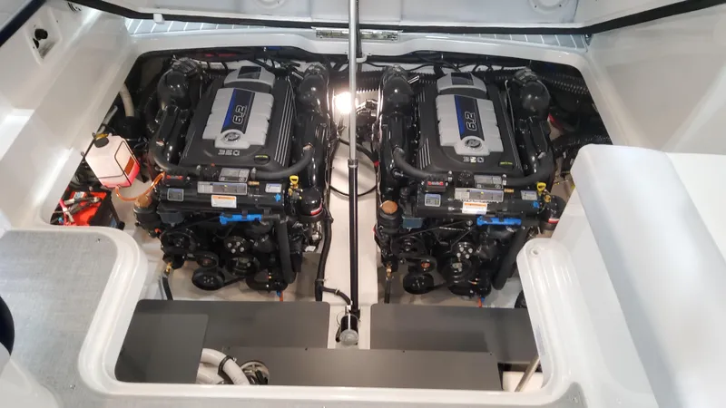 Slide: The Image of 2025 Formula 330 Crossover Bowrider I/O engine compartment with dual engines. - 11