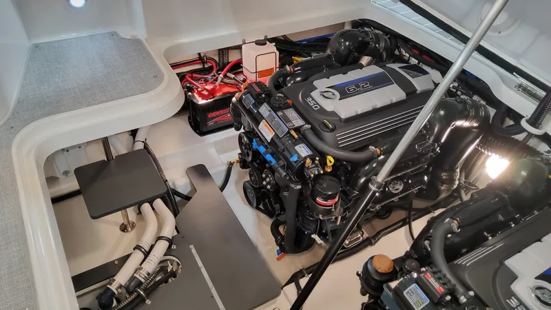 Slide: The Image of 2025 Formula 330 Crossover Bowrider I/O engine compartment with detailed components. - 12