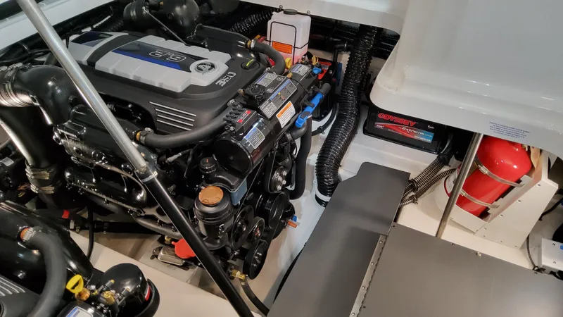 Slide: The Image of 2025 Formula 330 Crossover Bowrider I/O engine compartment with modern equipment. - 13