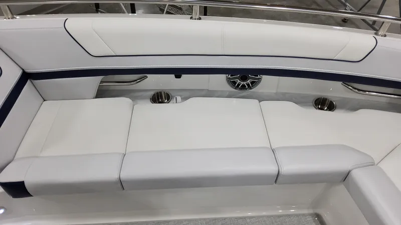 Slide: The Image of 2025 Formula 330 Crossover Bowrider I/O interior seating with sleek white upholstery. - 38