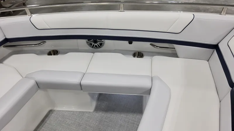 Slide: The Image of 2025 Formula 330 Crossover Bowrider I/O interior seating with sleek white upholstery. - 39