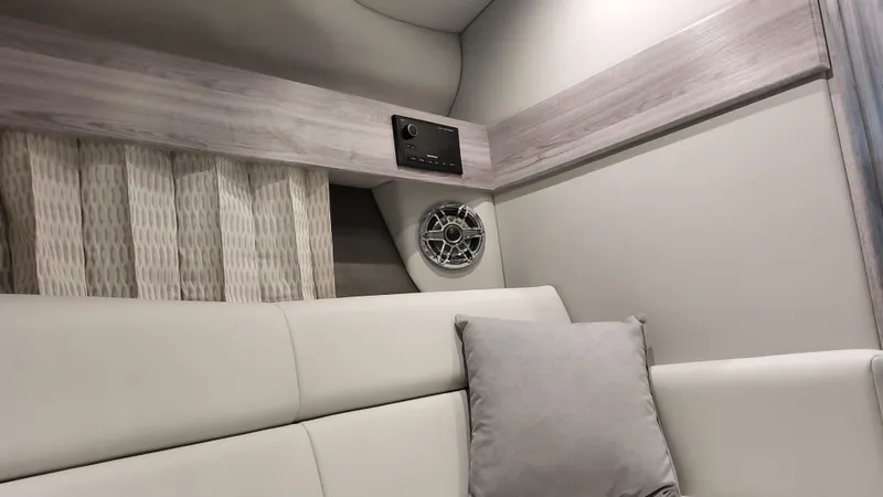 Slide: The Image of 2025 Formula 330 Crossover Bowrider I/O interior with modern seating and audio system. - 46