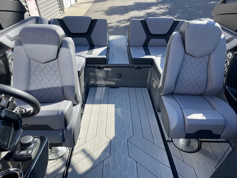 Slide: The Image of 2025 Yamaha Boats 222XD interior with modern gray seating and sleek design. - 12