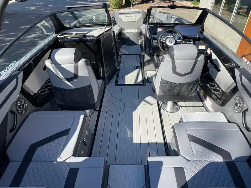 Slide: The Image of 2025 Yamaha Boats 222XD interior, featuring modern seating and sleek design. - 5
