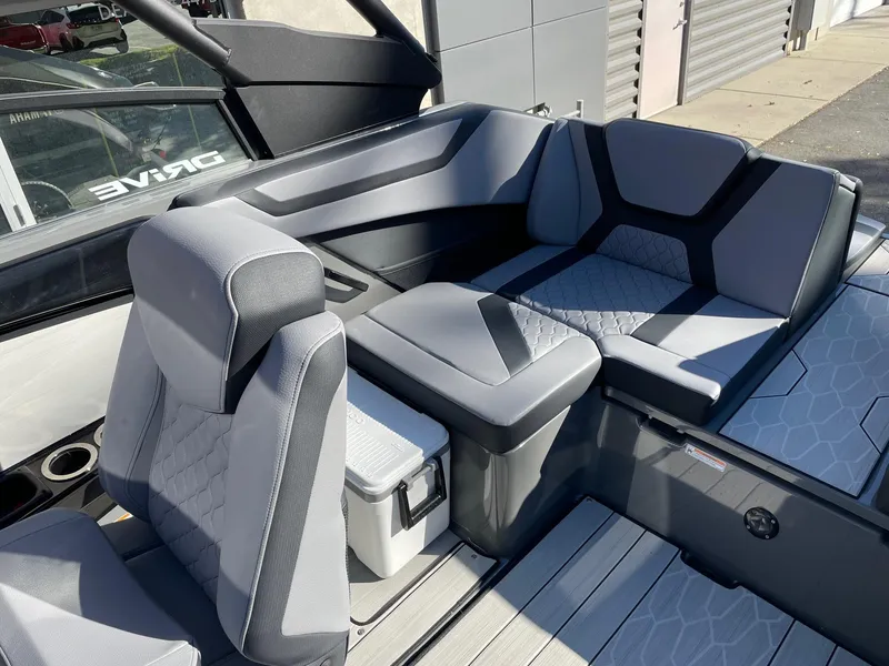 Slide: The Image of 2025 Yamaha Boats 222XD interior with modern seating and sleek design. - 7