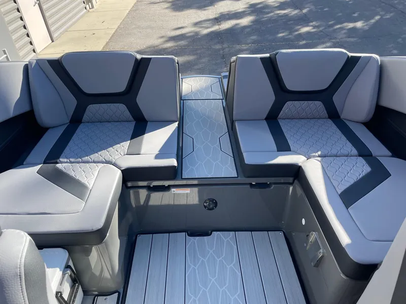 Slide: The Image of 2025 Yamaha Boats 222XD interior with modern gray seating and sleek design. - 8