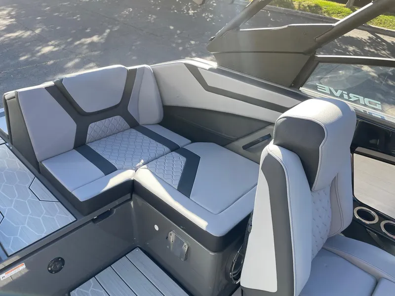 Slide: The Image of 2025 Yamaha Boats 222XD interior with modern seating and sleek design. - 9