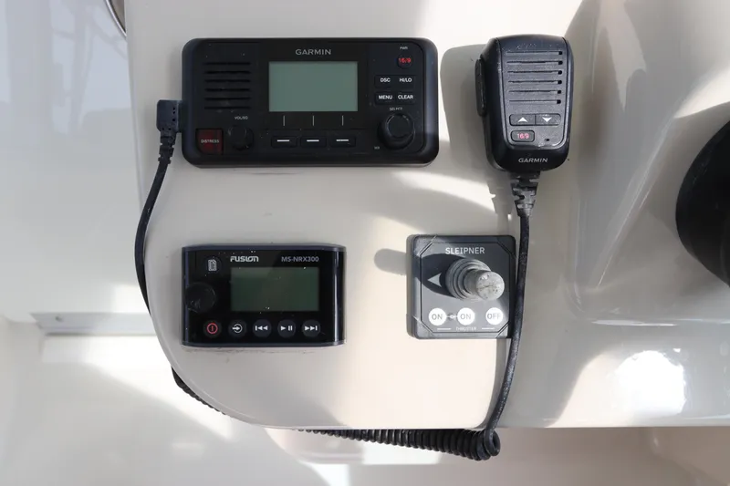 Slide: The Image of Control panel of 2019 Boston Whaler 315 Conquest with Garmin and Fusion devices. - 31