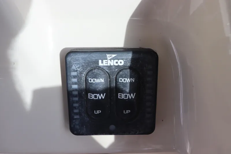 Slide: The Image of Lenco trim tab control panel on 2019 Boston Whaler 315 Conquest. - 32