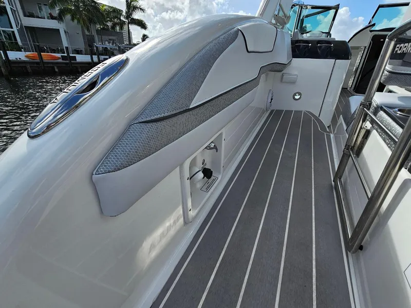 Slide: The Image of 2023 Formula 350 Crossover Bowrider, sleek deck design, luxury boating experience. - 18