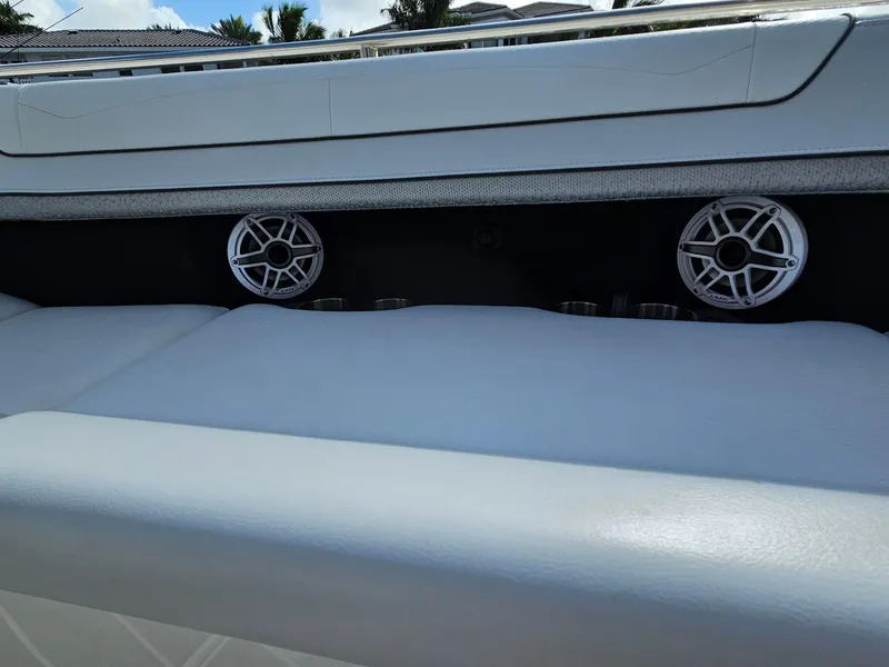 Slide: The Image of 2023 Formula 350 Crossover Bowrider interior with sleek seating and built-in speakers. - 33