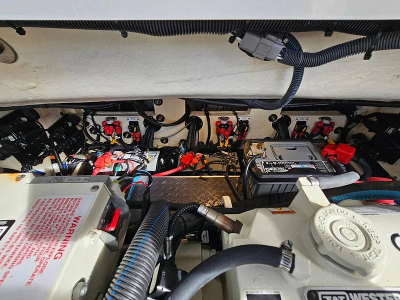 Slide: The Image of Engine compartment of 2023 Formula 350 Crossover Bowrider with wiring and components. - 44