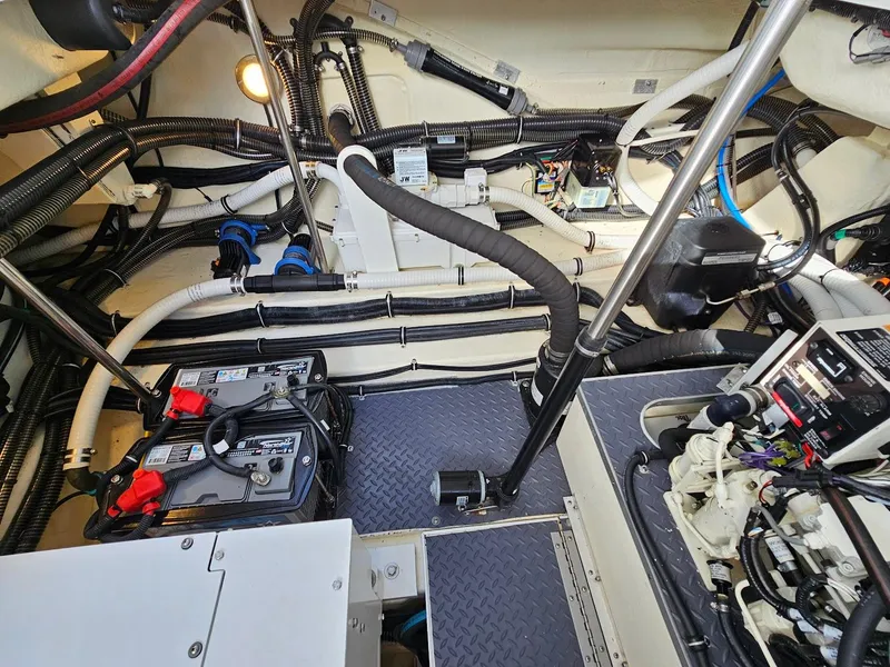 Slide: The Image of Engine compartment of 2023 Formula 350 Crossover Bowrider with wiring and battery systems. - 45