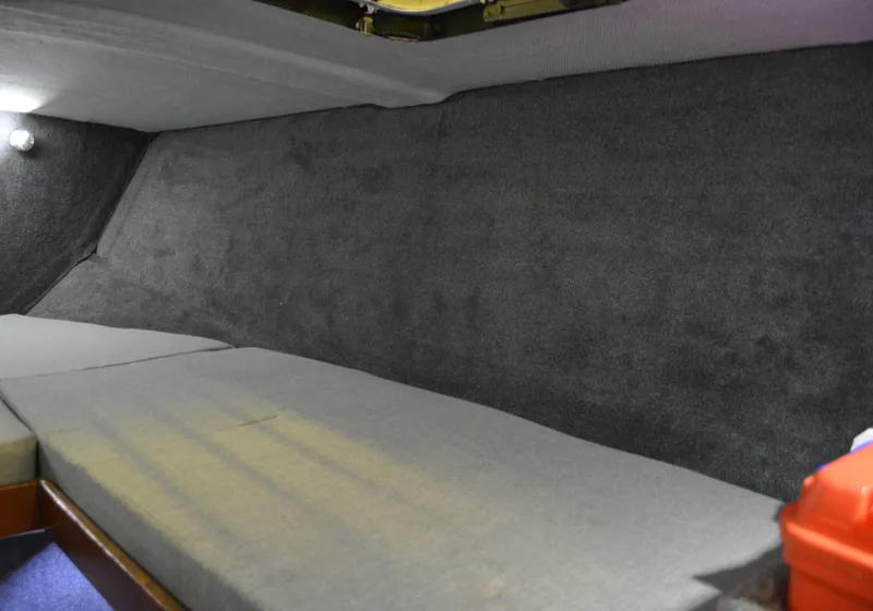 Slide: The Image of Interior cabin of 1980 Sutphen 30 Oceanpacer boat with gray upholstery. - 14