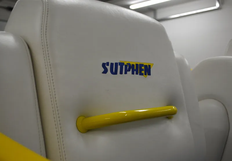 Slide: The Image of Close-up of Sutphen 30 Oceanpacer 1980 boat seat with yellow handle. - 4