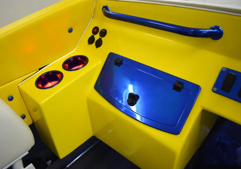 Slide: The Image of Bright yellow and blue interior of a 1980 Sutphen 30 Oceanpacer boat. - 9