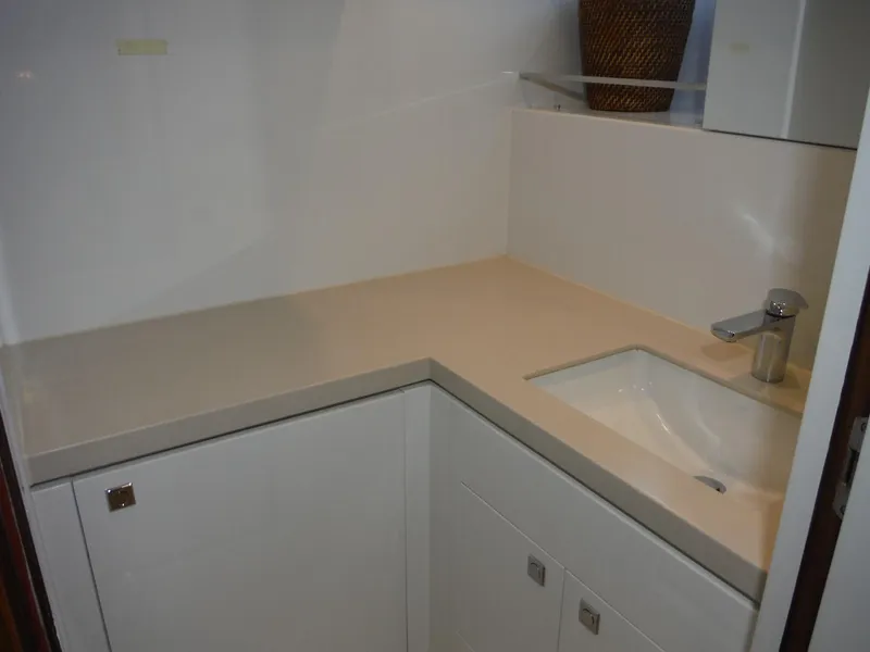 Slide: The Image of Modern bathroom sink area on 2015 Horizon E88 yacht. - 46
