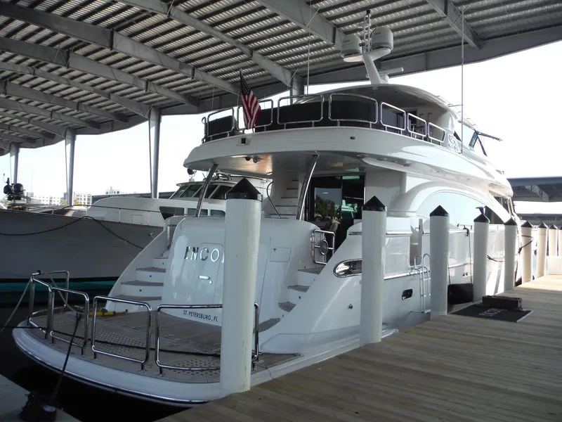Slide: The Image of Luxury Horizon E88 yacht docked under a covered marina, 2015 model. - 7
