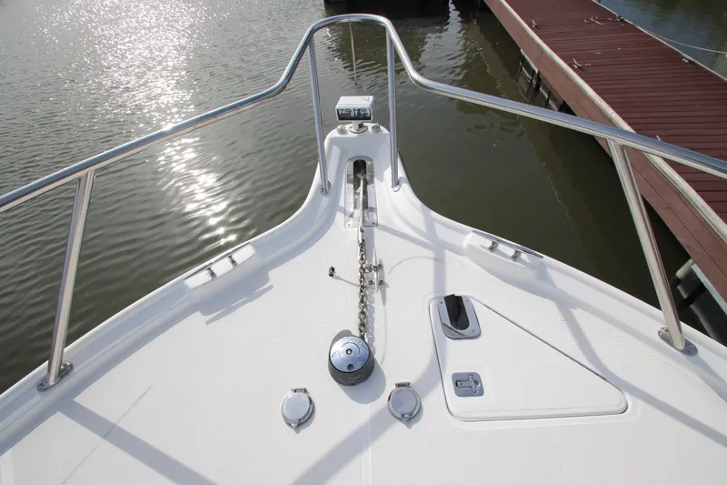 Slide: The Image of Bow view of 2007 Tiara Yachts 4200 Open, featuring anchor and deck details. - 14