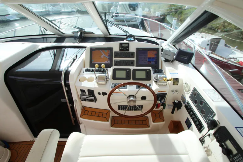 Slide: The Image of 2007 Tiara Yachts 4200 Open helm with advanced navigation systems and luxurious interior. - 20