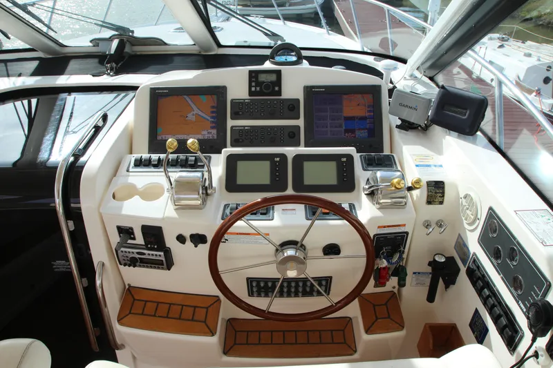 Slide: The Image of 2007 Tiara Yachts 4200 Open helm with advanced navigation and control systems. - 21