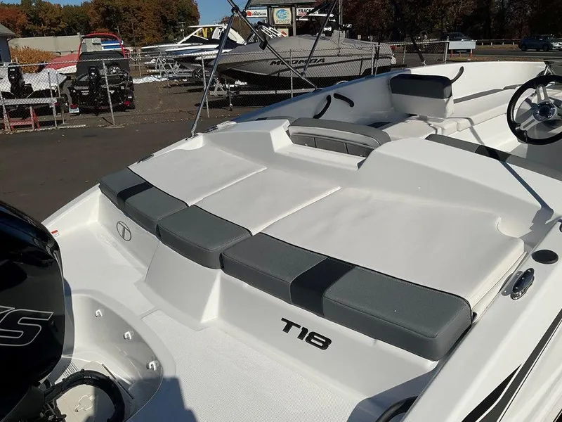Slide: The Image of 2025 Tahoe T18 boat with sleek seating and modern design. - 10